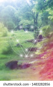 Abstract sacred geometry interlocking geometric shapes design template on colorful forest background