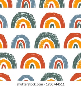 Abstract Scandinavian rainbow shapes pattern in doodle or scribble style as a seamless texture for contemporary trendy surfaces design. Colorful vector illustration