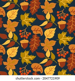 Abstract seamless autumn background with yellow and orange leaves on a dark background. Vector autumn background, backdrop, wallpaper. Fabric pattern. Seamless vector texture.