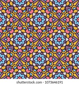 Abstract seamless backdrop. Design for prints, textile, decor, fabric. Round colorful texture in violet, blue, yellow  and red colors. Mandala background