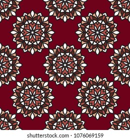 Abstract seamless backdrop. Design for prints, textile, decor, fabric. Round texture in red color. Mandala background