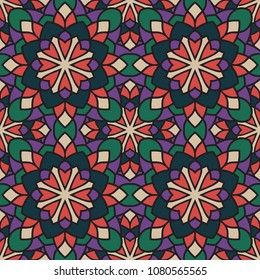 Abstract seamless backdrop. Round colorful texture in green, violet and red colors. Mandala background