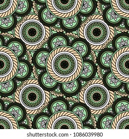 Abstract seamless backdrop. Round colorful texture in green and yellow colors. Mandala background