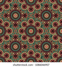 Abstract seamless backdrop. Round colorful texture in green, orange and red colors. Mandala background