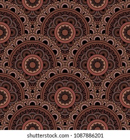Abstract seamless backdrop. Round colorful texture in brown and black  colors. Mandala background. Oriental pattern for design