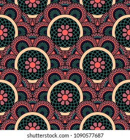 Abstract seamless backdrop. Round colorful texture in green, red and beige colors. Mandala background. Oriental pattern for design