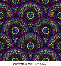 Abstract seamless backdrop. Round colorful texture in violet, blue and yellow colors. Mandala background. Oriental pattern for design