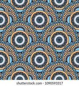 Abstract seamless backdrop. Round colorful texture in blue and yellow colors. Mandala background. Oriental pattern for design