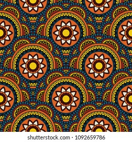 Abstract seamless backdrop. Round colorful texture in yellow, blue and orange colors. Mandala background. Oriental pattern for design