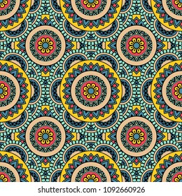 Abstract seamless backdrop. Round colorful texture in yellow, blue and red colors. Mandala background. Oriental pattern for design