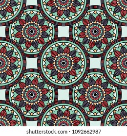 Abstract seamless backdrop. Round colorful texture in blue, red and gray colors. Mandala background. Oriental pattern for design