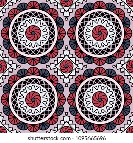 Abstract seamless backdrop. Round colorful texture in red, blue and rose colors. Mandala background. Oriental pattern for design