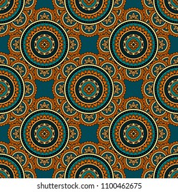 Abstract seamless backdrop. Round colorful texture in yellow and bllue colors. Mandala background. Oriental pattern for design