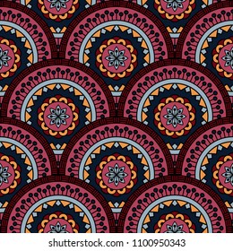 Abstract seamless backdrop. Round colorful texture in red and gray colors. Mandala background. Oriental pattern for design