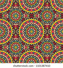 Abstract seamless backdrop. Round colorful texture in pink, blue and yellow colors. Mandala background. Oriental pattern for design
