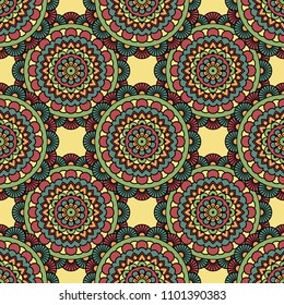 Abstract seamless backdrop. Round colorful texture in green, yellow and red colors. Mandala background. Oriental pattern for design