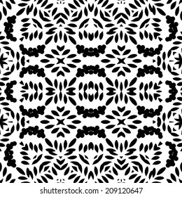 Abstract seamless background with black symbolical floral patterns on white. Vector