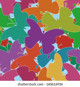 Abstract seamless background with colorful butterflies silhouettes. Vector