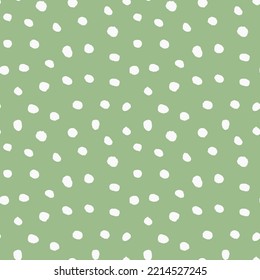 Abstract seamless background with hand drawn polka dots, green and white pattern