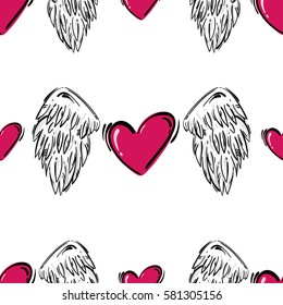Abstract seamless background with heart and wings.
