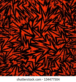 Abstract seamless background made of red sharp shapes on black grunge background