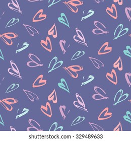 Abstract seamless background pattern with hearts hand painted , craft paper. 