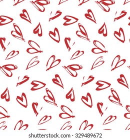 Abstract seamless background pattern with hearts hand painted , craft paper. 
