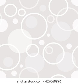 Abstract seamless background of a variety of rings and circles.