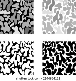 Abstract seamless backgrounds with cow pattern. Vector illustration. 