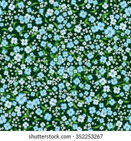 abstract seamless blue floral ornament on green