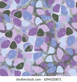 Abstract seamless camouflage. Multi-colored spots. Strange figures. Fashionable colors. Texture is covered with a transparent network.