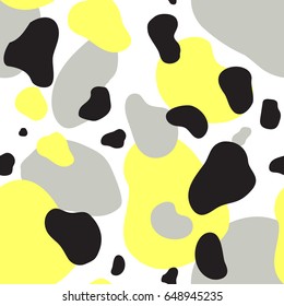 Abstract seamless chaotic pattern with military style. Modern wallpaper in trendy pastel colors. Yellow, gray and black. Background texture with spots and blots. Repeat endless design. Vector.