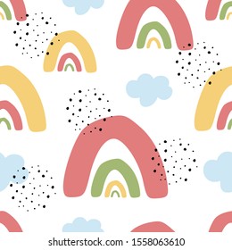 Abstract seamless childish pattern with freehand rainbows, clouds and dots. Creative hand drawn kids texture for fabric, wrapping, textile, wallpaper and apparel design idea. Vector illustration.
