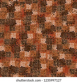 Abstract seamless. Colors of autumn gold. Perpendicular hatching.