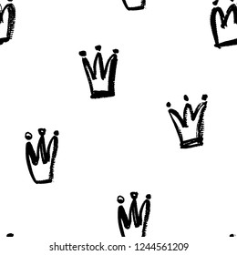 Abstract seamless crown pattern. Black and white tiaras repeated backdrop. 
