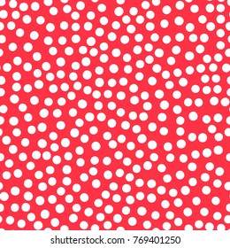 Abstract seamless doodle polka dot pattern on red