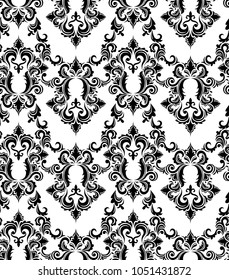 Abstract seamless ethnic pattern. curls and swirling leaves. Classic European medieval repeated backdrop. black and white Venetian tracery. damask iterative weave. monochrome. Baroque style. 