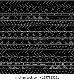 Abstract seamless ethnic striped pattern with primitive geometric elements. Folk stylized print template for paper and fabric (textile, wallpaper, wrapping). Boho fashion style. EPS10 vector