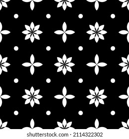Abstract seamless floral dots pattern on black background. Vector art.
