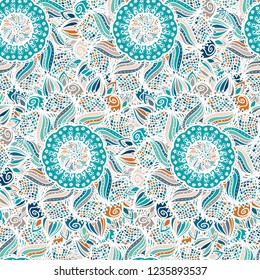 Abstract seamless floral vector pattern made of colorful mandalas. Blue ethnic background. Texture design for surface, fabric, textile. Repeating wallpaper with flowers.