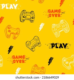 Abstract seamless gamepads pattern on yellow background. Game pads repeat print with words Play, game over, lightning sign. Digital technology endless background. Digitally repeated wallpaper for boy