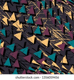Abstract seamless geometric background with chaotic triangles. Grunge, texture pattern. Wallpaper for boys and girls. Urban colorful backdrop.