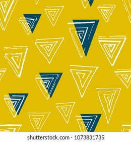 Abstract seamless geometric background with  triangles, scuffed, sprays. Grunge pattern. 