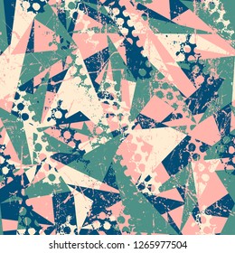 Abstract seamless geometric background with triangles cracked texture, dots, drops and splashes. Grunge pattern for boys, girls, sport, fashion. Urban colorful wallpaper.