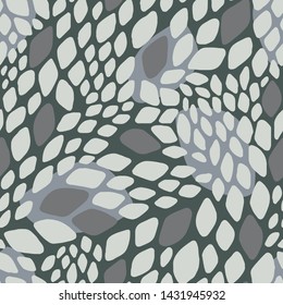 Abstract seamless geometric pattern. Colorful rhombuses. Stylish background with hand drawn scale. Squama. Snake skin texture. Vector illustration with leaves. 
