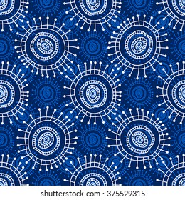 Abstract seamless geometric pattern in doodle style. White snowflakes on blue background, hand drawn, vector. For background design and decoration, wallpaper, packaging, fabrics, textiles.