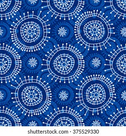 Abstract seamless geometric pattern in doodle style. White snowflakes on blue background, hand drawn, vector. For background design and decoration, wallpaper, packaging, fabrics, textiles.