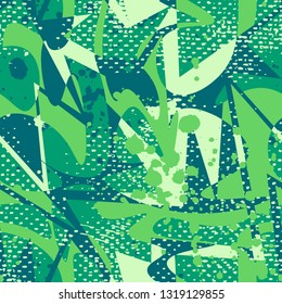 Abstract seamless geometric pattern. Grunge urban repeated backdrop for boy, textile, wrapping paper. Wavy shapes spray paint.
