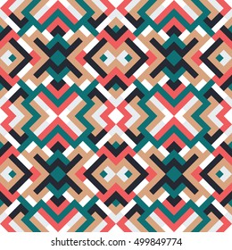 Abstract seamless green pattern for design. Vector geometric background of triangles in red and blue colors. Texture for textile, clown, carpeting, warp, book cover, clothes