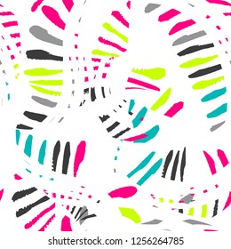 Abstract seamless grunge pattern. colorful spots brush tracks repeated backdrop for fashion textile, clothes, wrapping paper. 